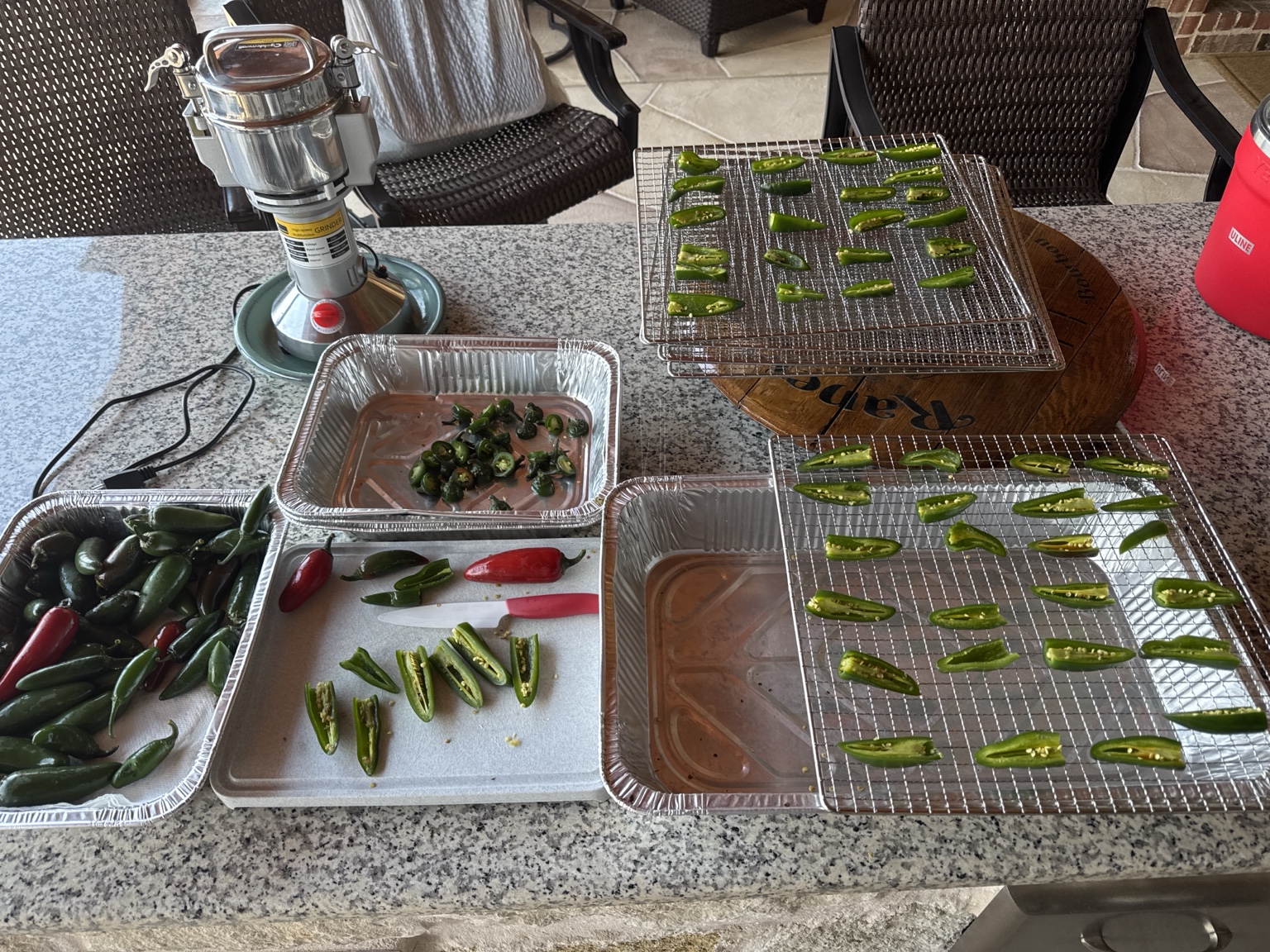 Fresh peppers prepared on racks