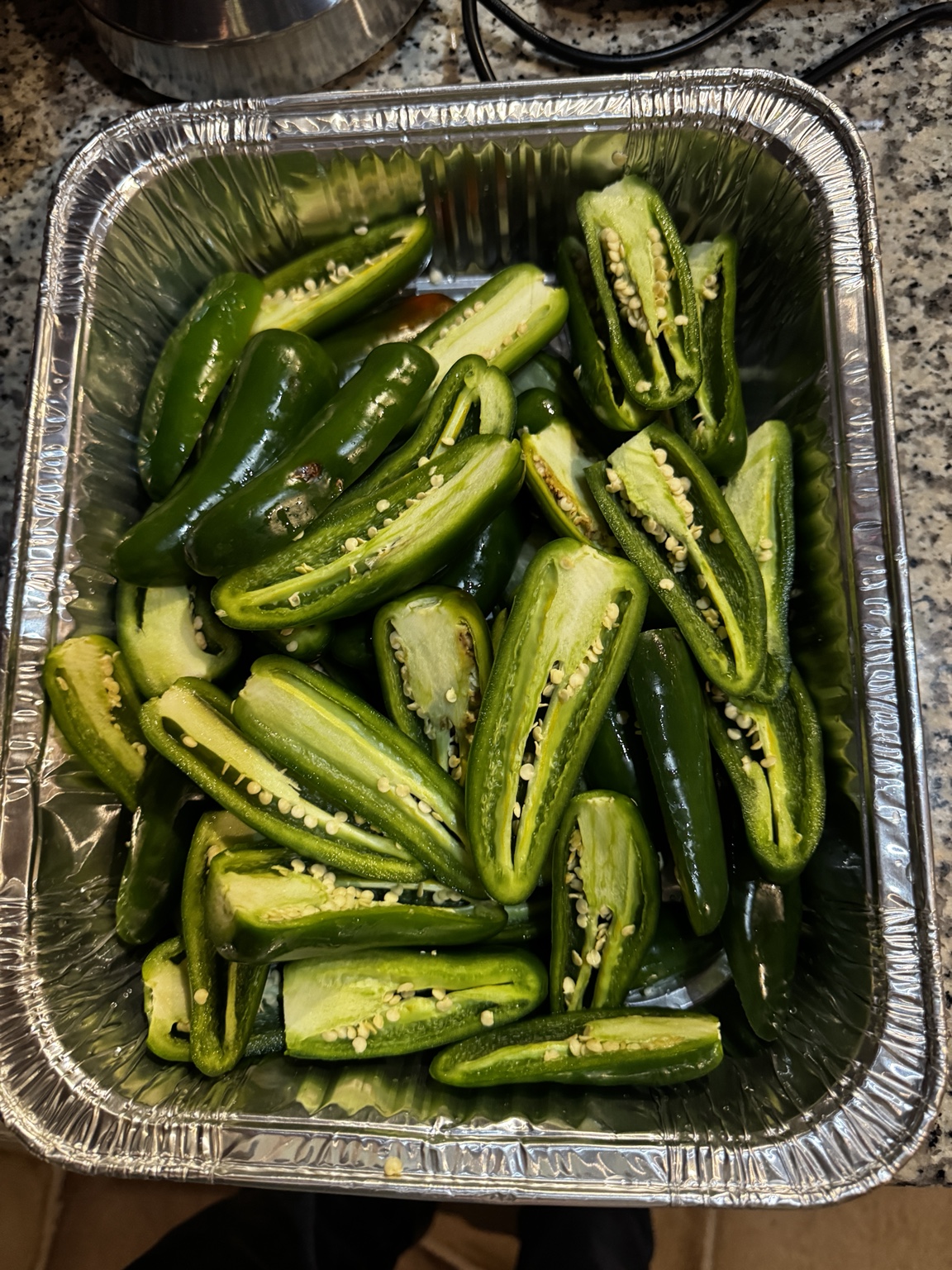 Jalapeños split and prepared